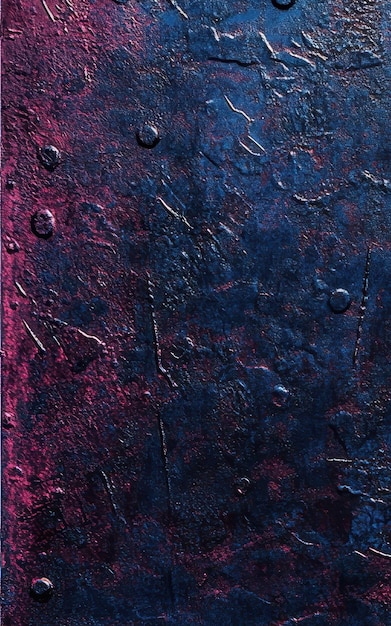 Photo blue and burgundy colored hammered metal texture