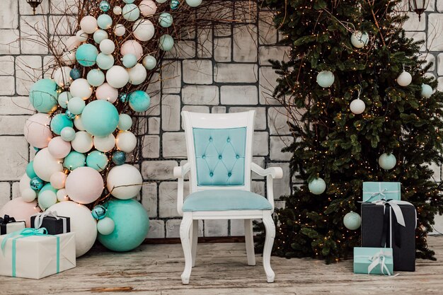 Blue chair in the Christmas interior Christmas Arch with balloons