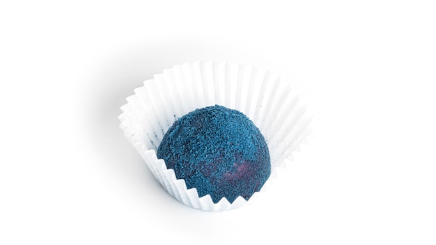 Blue, chocolate candy truffle isolated.