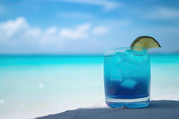 Blue cocktail on the white sand of a paradisiacal beach with the sea in the background Copy space Ai generative