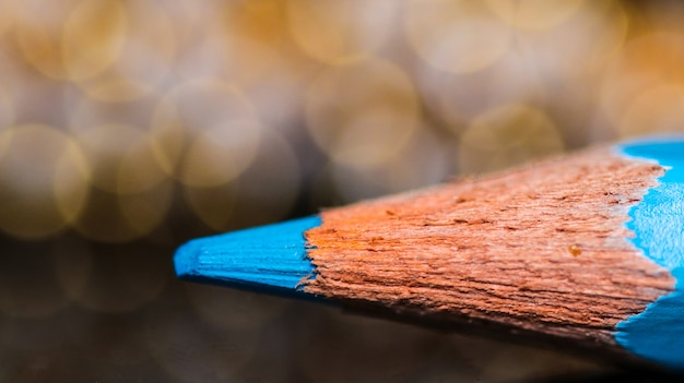 Blue Color Pencil with Bokeh Background