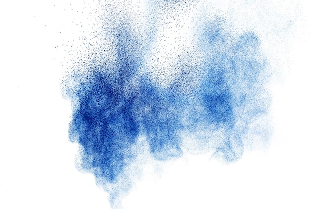 Blue color powder explosion on white background.