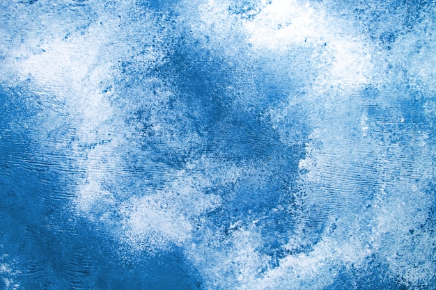 Blue concrete background with white overflow