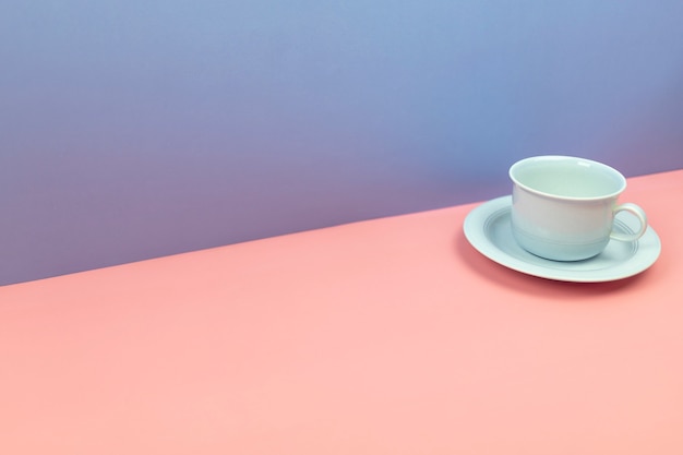 blue cup drink with blue and pink pastel background