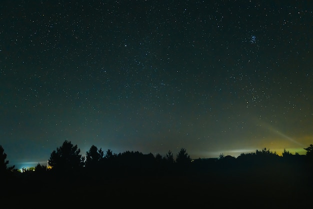 Blue dark night sky with many stars. Space background