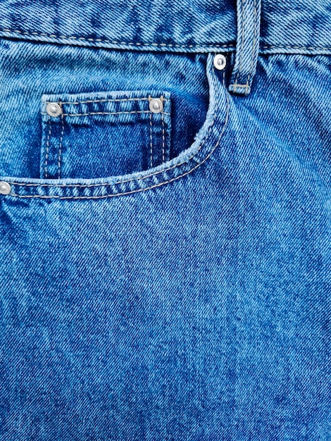 Blue denim Jeans pocket with revits texture background