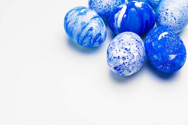 blue Easter eggs isolated on white.