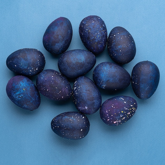 Blue eggs on a blue background Top view