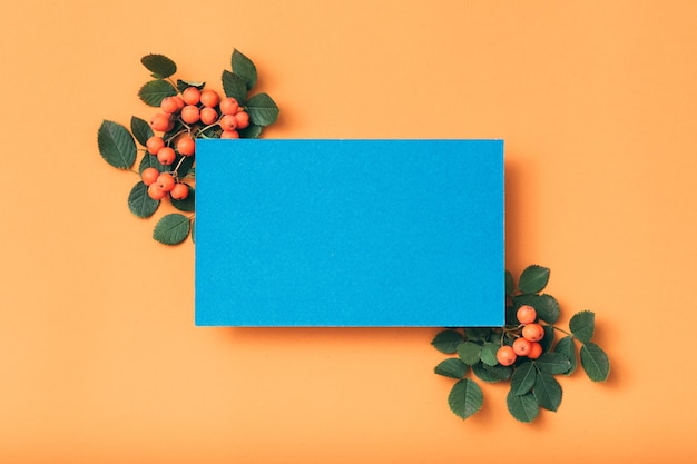 Blue empty paper. Holiday greeting. Ashberry festive arrangement.