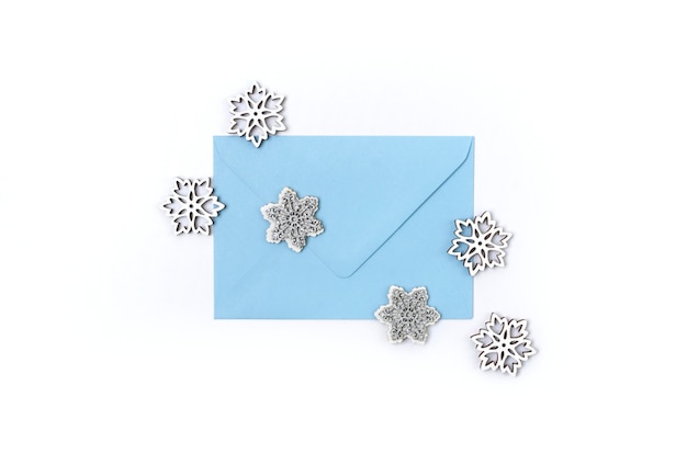 Blue envelope with snowflakes isolated