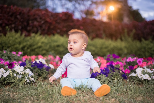 Blue-eyed baby in the garden