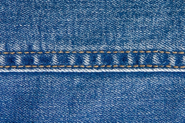 blue fabric jeans background close up