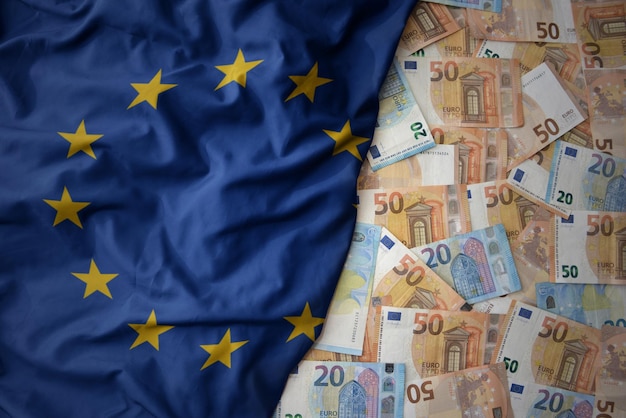 a blue flag with euro banknotes on it