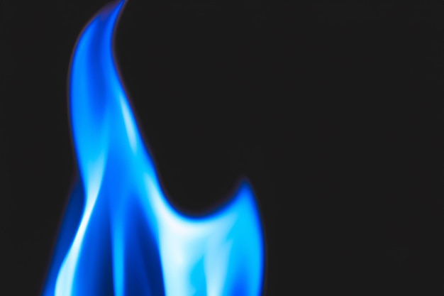 Photo blue flame isolated on black background