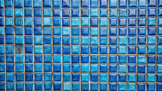 Photo blue glass tiles with a pattern of squares and the word quot on the bottom quot