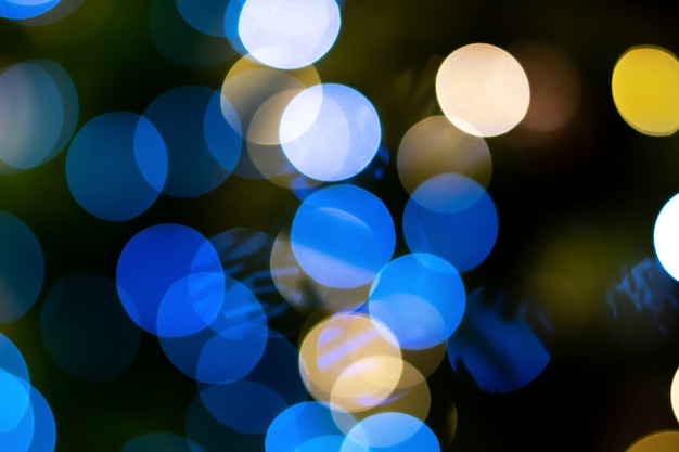 Blue glitter bokeh background. Abstract blue bokeh background. Copy space.