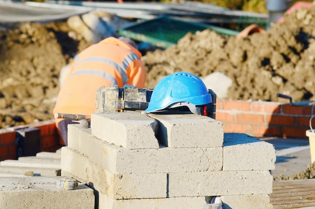 Blue helmet on top of concrete block