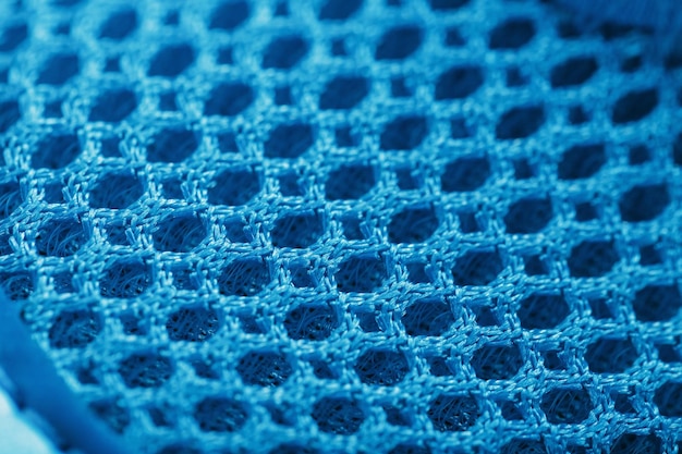 Blue highway cycling shoes on a blue background