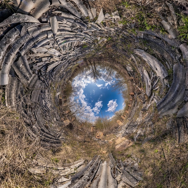 Blue hole sphere little planet inside green grass round frame background