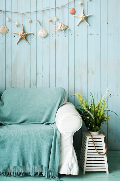 Blue interior of beach house with nautical decor