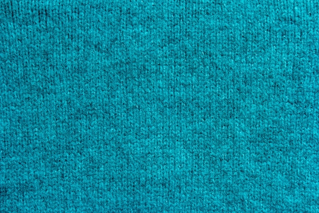 Blue knitting wool texture background.