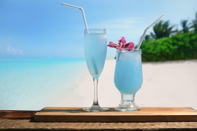 Blue lagoon cocktails tropical beach on background Summer resort concept