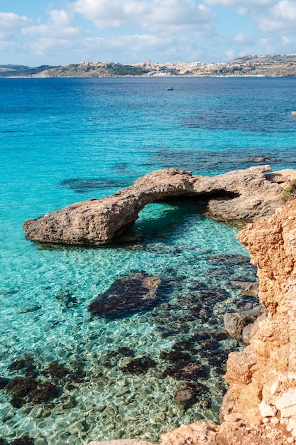 The Blue Lagoon in Comino Island. Idyllic turquoise beach in Malta.