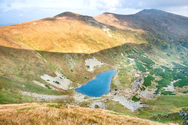 Blue lake in the mountains. Aerial view