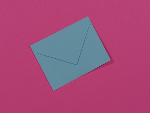 Blue letter on pink background