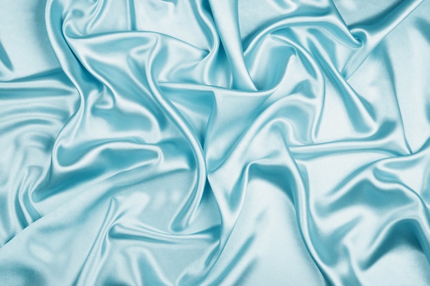 Blue luxury satin fabric texture for background