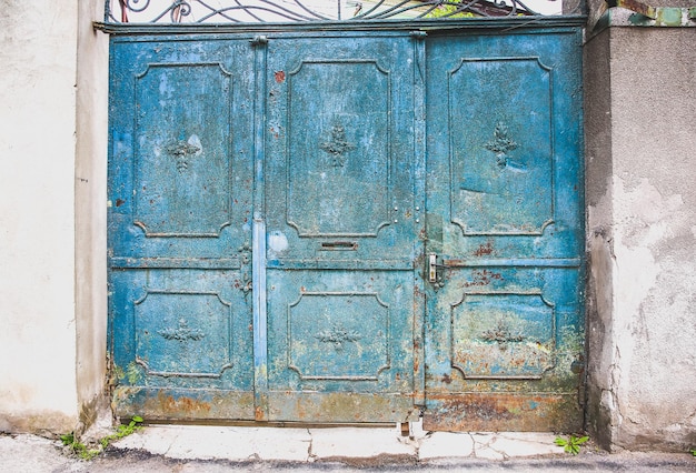 Blue metal doors Old vintage style Rusty texture