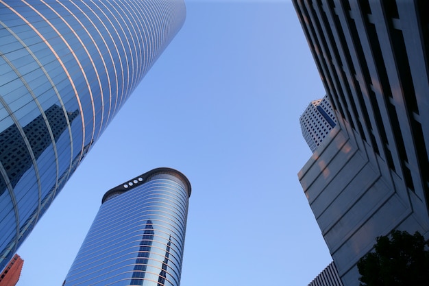 Blue mirror glass facade skyscraper buildings