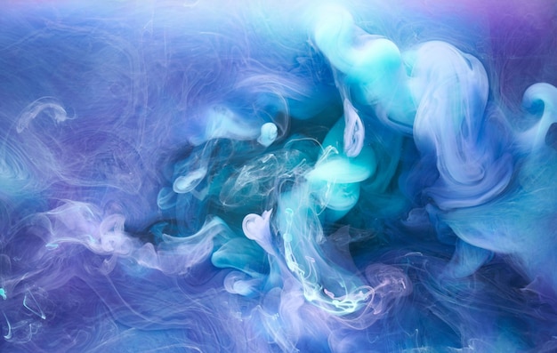 Blue multicolored smoke abstract background acrylic paint underwater explosion