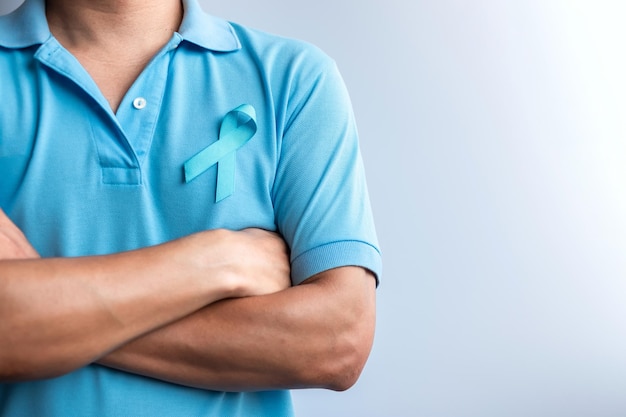 Blue November Prostate Cancer Awareness month Man in blue shirt with Blue Ribbon for support people life and illness Healthcare International men Father Diabetes and World cancer day