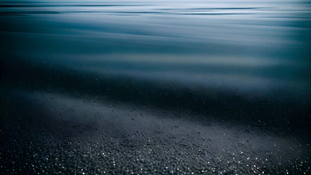 A blue ocean with a dark blue background and the water in the foreground