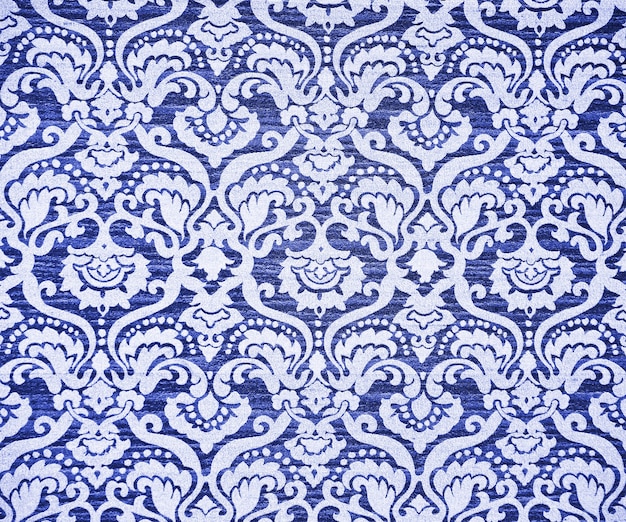 Blue ornate vintage wallpaper. Background or texture