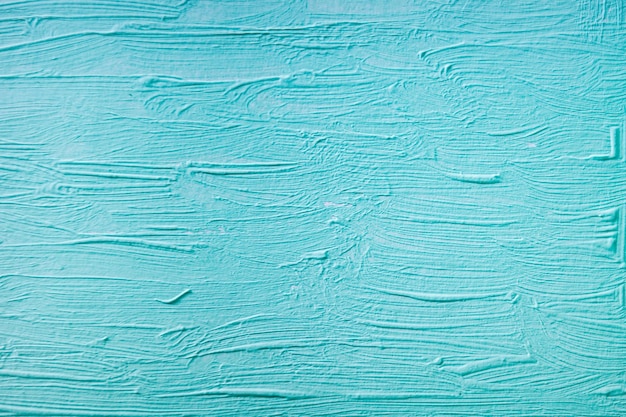 Blue paint texture on a canvas surface as a background