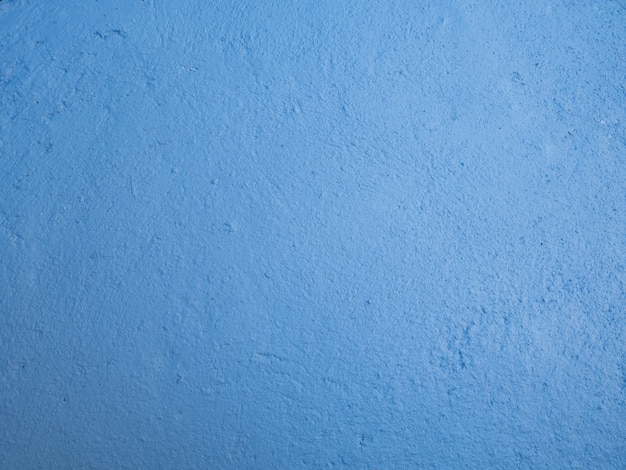 Blue painted cement wall, brush paint concrete wall texture