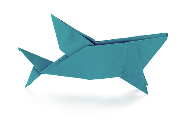 Blue paper shark origami isolated on a white background