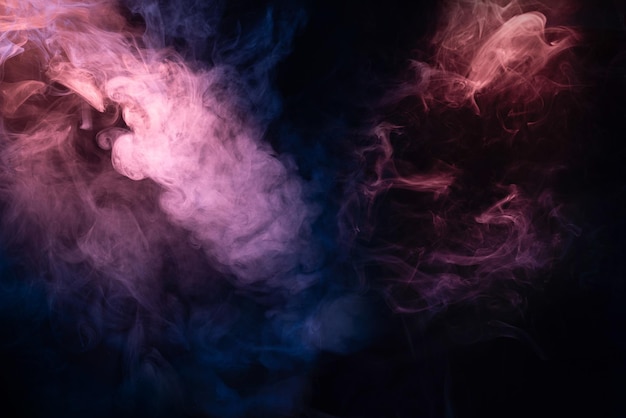 Blue and pink steam on a black background