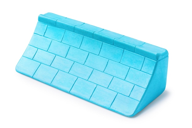 Blue plaster ramp for fingerboarding imitating a wall isolated on a white background