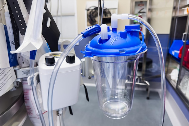 a blue plastic cup with a blue lid that says quot nozzle quot