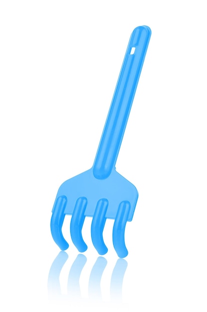 Blue plastic rake isolated on a white background with reflection closeup Children's toys for playing in the sandbox Games for early child development