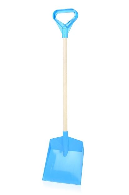 Blue plastic shovel isolated on a white background closeup Children's toys for playing in the sandbox Games for early child development Childhood concept