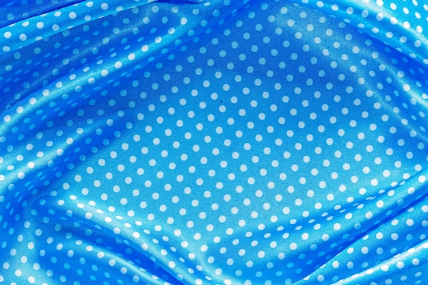 Blue polkadot cotton fabric top view