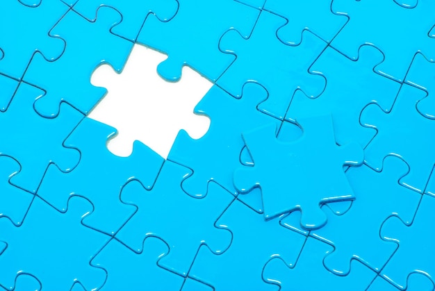 Blue puzzles for background business concept