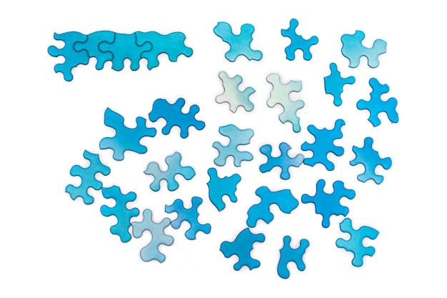 Blue puzzles on white background Difficult unusual task concept