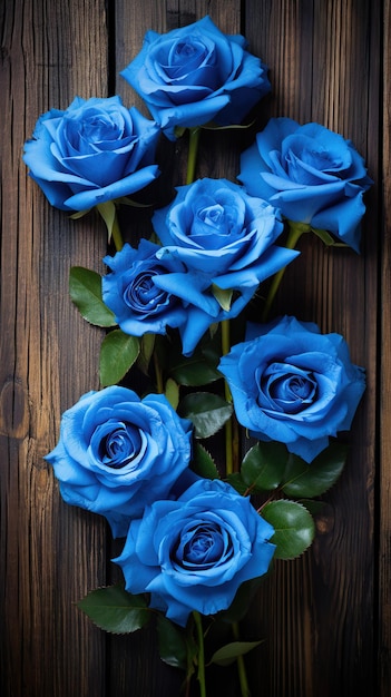 Blue rose composition on wooden tabletop