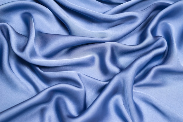 Blue silk or satin luxury fabric texture