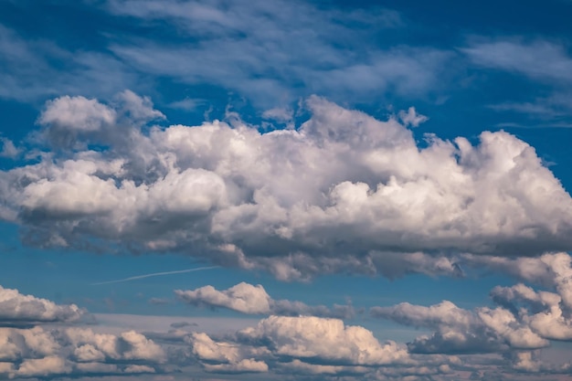 Blue sky background with big white striped clouds blue sky panorama may use for sky replacement